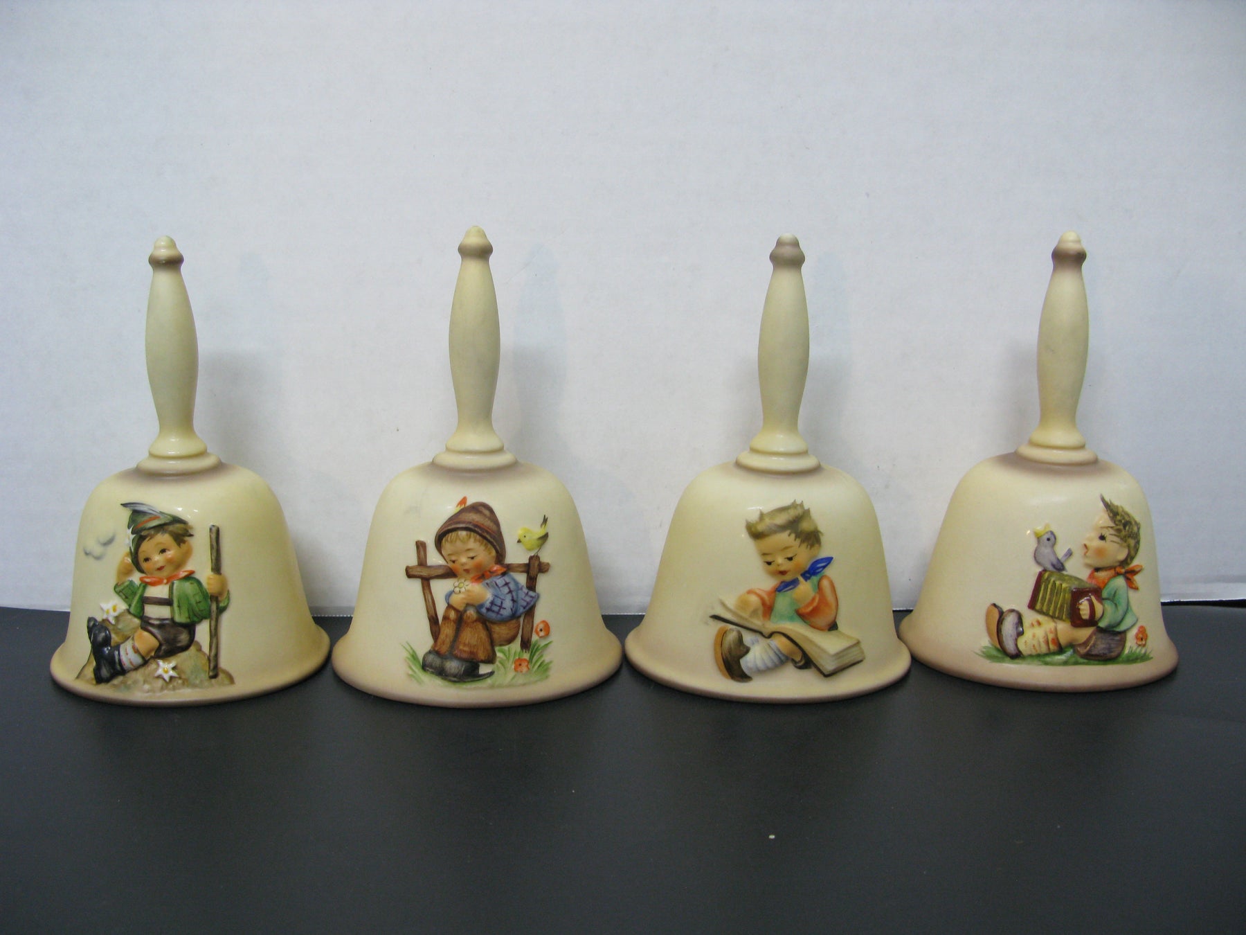 4 Handcrafted Goebel Annual Bells