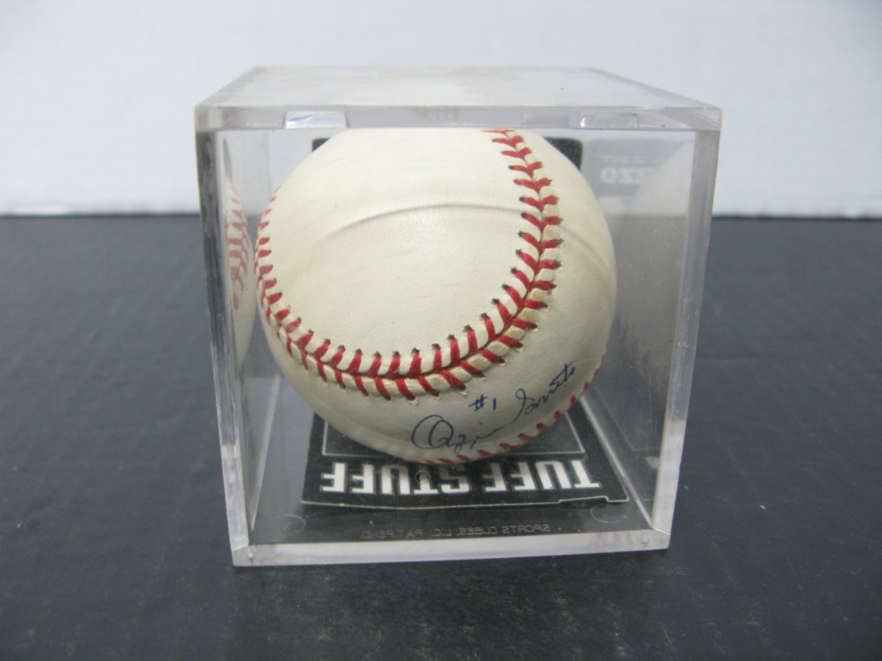 Autographed Baseball by Ozzie Smith