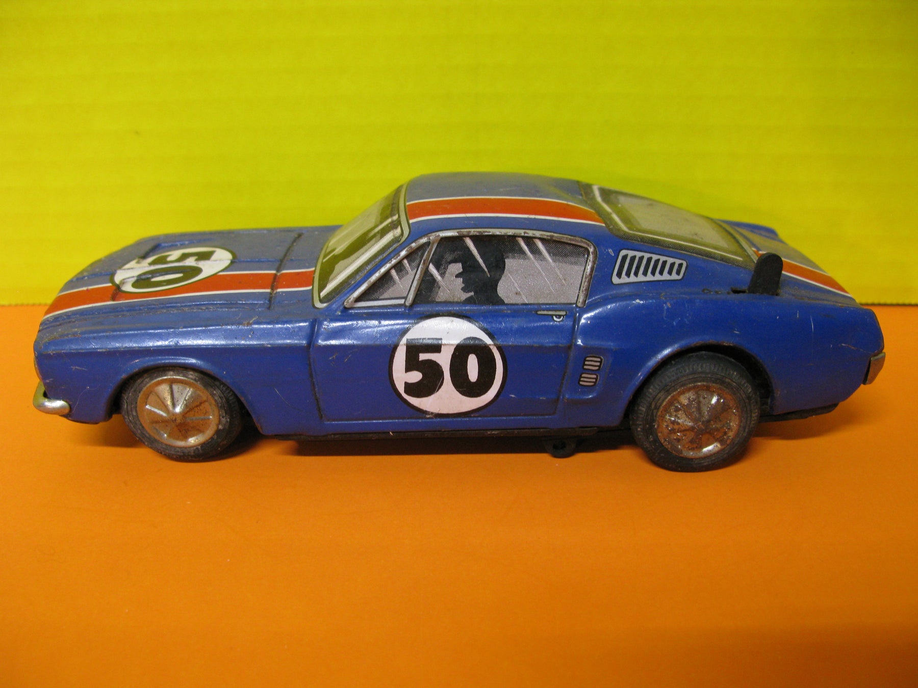 1960's Ford Mustang Bump'n Go Tin Toy Car