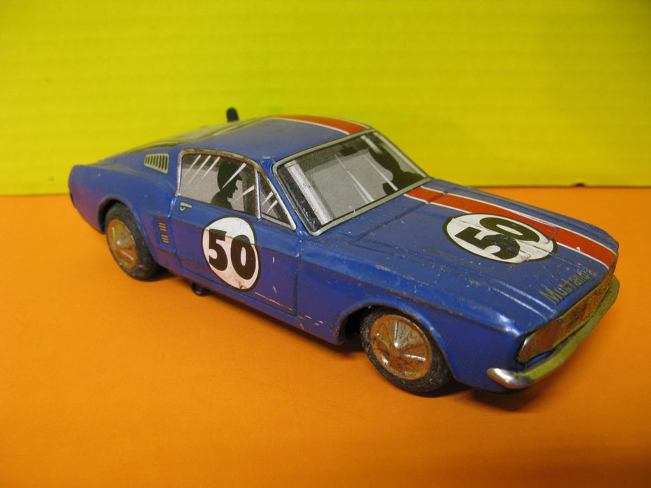 1960's Ford Mustang Bump'n Go Tin Toy Car